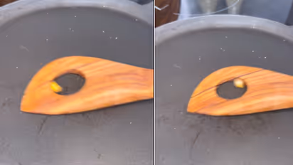 Viral-video-of-a-women-making-single-popcorn-in-a-pan