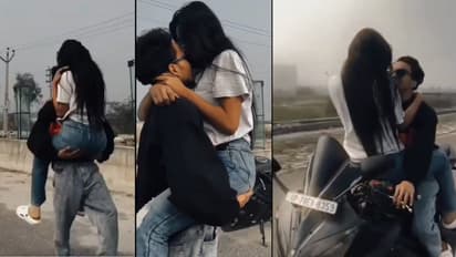 UP kanpur highway couple kiss stunt video viral on social media