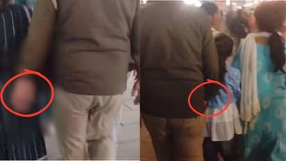 UP News Varanasi Policeman Bad Touch many women and girls from behind viral video 