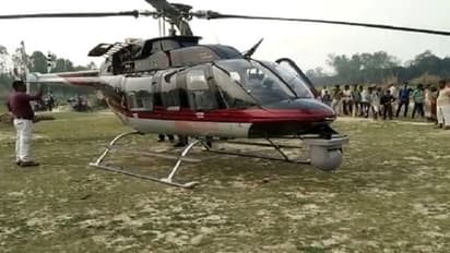 Emergency landing of helicopter in the field due to oil leaks