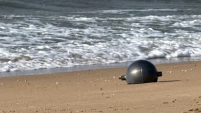 mysterious large balls that washed up on a beach in Australia