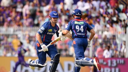 Lucknow Super Giants' Mitchell Marsh and Aiden Markram run between the wickets