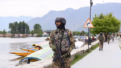 CRPF personnel patrol on the banks of Dal lake after the Pahalgam terror attack