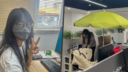 Chinese Workers Turn To Parasols, Sunscreen Indoors To Prevent 'Office Ageing'