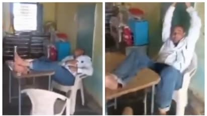 teacher comfortably sleeping in class room