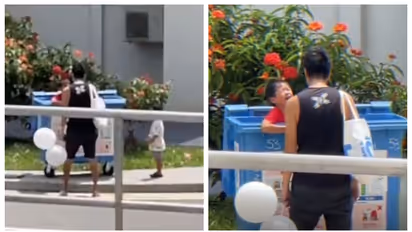 father who placed his crying son in the Recycling bin