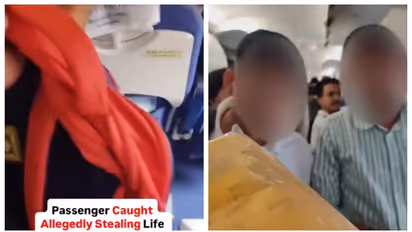 Man stealing life jacket from indigo flight