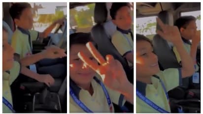 School students driving Thar through a busy road in Rajasthan