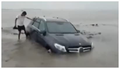 Mercedes bens stuck in sand in river after the stunt