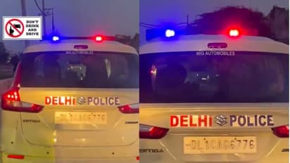 Viral Video Shows Delhi Cop Drinking Liquor Inside PCR Van, Head Constable Suspended | WATCH