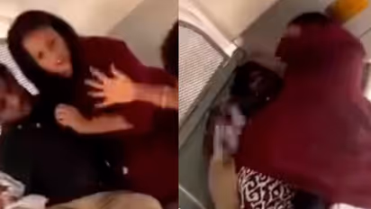 Woman Slaps Couple Multiple Times Over Alleged Objectionable Behaviour on Train; Netizens Ask, ‘Is This Scripted?