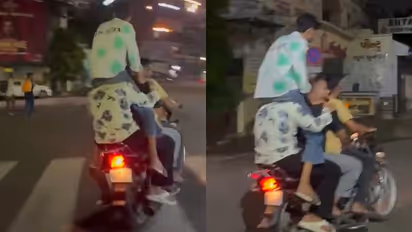 Ahmedabad Viral Video Shows 4 Youths on One Bike, One Perched on Another’s Shoulders | WATCH