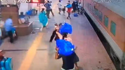 Caught On Cam: Hyderabad Man Nearly Falls Under Moving Train While Holding Daughter, RPF Cop Saves Them