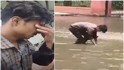 man crying in road