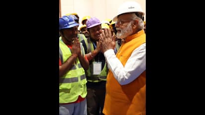 PM Modi interact with workers of new parliament building