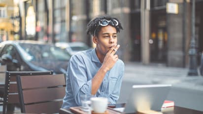Smoking cigarettes with tea