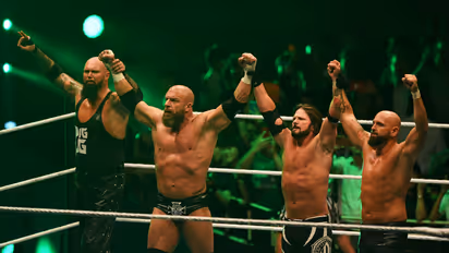 AJ Styles and team