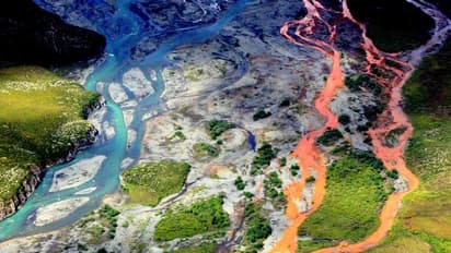 Scenic aerial photo of Alaska’s Kutuk River stained orange