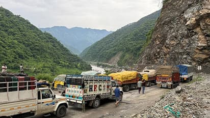 Damaged roads and blocked traffic after heavy rains (ANI)
