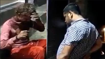 bjp leader urinates on tribal man