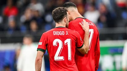 Diogo Jota with Cristiano Ronaldo