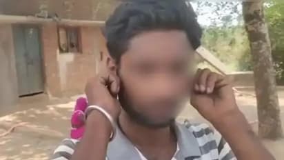 A young man doing sit-ups while holding his ears in Satna