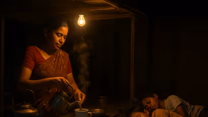 Woman selling tea late at night for kids' education, better future