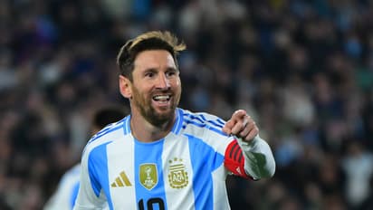 Lionel Messi celebrates after scoring goal against Venezuela