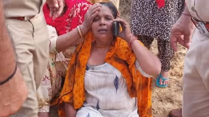 woman climbs electricity pole