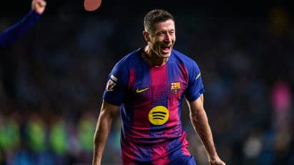 Lewandowski hat-trick helps Barca punish Real Madrid slip