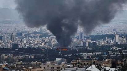  Smoke rises from a building in Tehran