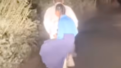 Father Cycles Through Dark Night With Daughter After Her Exam