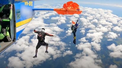 Skydiver gets stuck on the wing of the plane