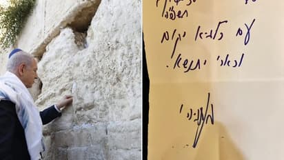 Israeli PM Netanyahu places note at Western Wall quoting scripture