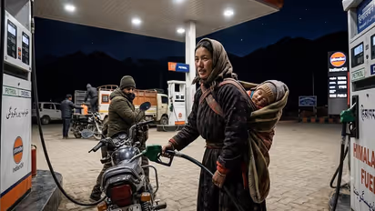 Motherhood Meets Hard Work - Ladakh Woman’s Petrol Pump Shift Goes Viral
