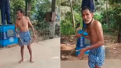 drunk man plays with snake