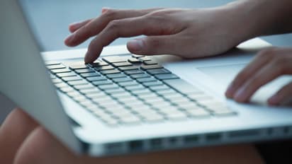 woman using laptop , representative image