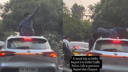 Delhi Man Performs Stunts on Moving Car