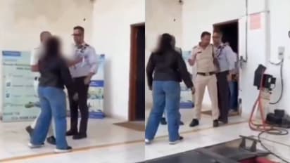 Tense moment unfolds between employee and manager during dispute