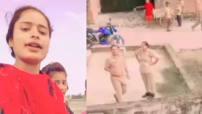 woman films reel outside police station