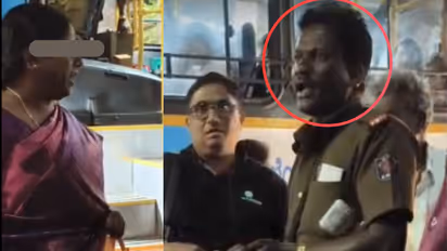 BMTC Bus conductor Suspended