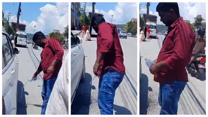 Indian tourist Spitting on the road