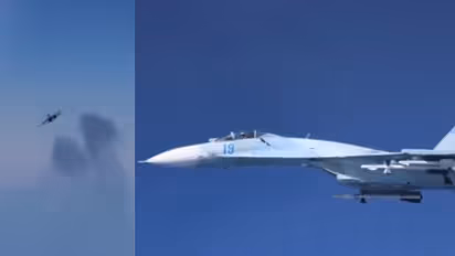 Russian jets aggressively buzzing an unarmed RAF surveillance plane over the Black Sea