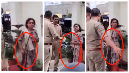 woman with double barreled gun at police outpost