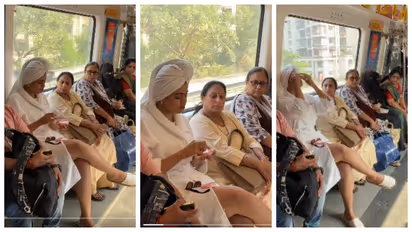 Metro Passenger In Bathrobe,