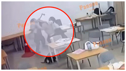 Student attacks teacher with an axe