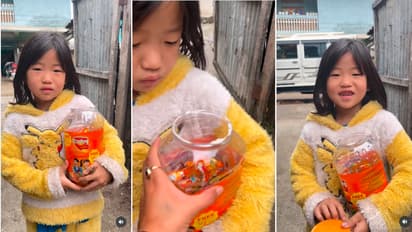 Girl Distributing Hajmola