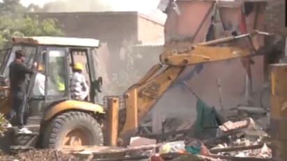 Amdavad Municipal Corporation (AMC) demolishes illegal settlements near Chandola lake
