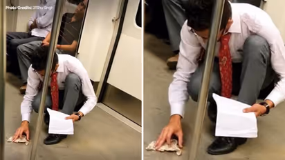 Delhi Metro Boy Cleans Spilled Food Rather Than Walking Away, Internet Praises His Civic Sense
