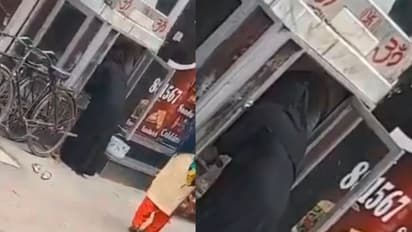 Muslim woman prays at temple